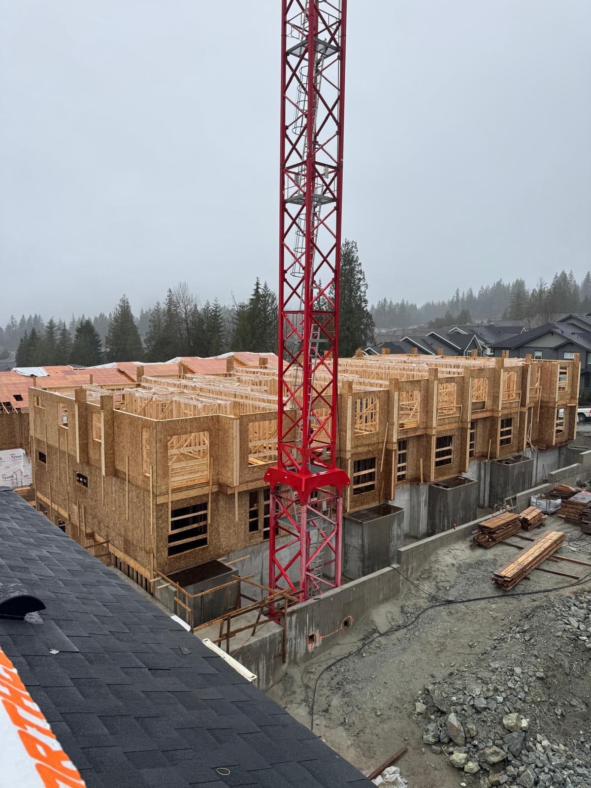 Multi-family building with a tower crane on site